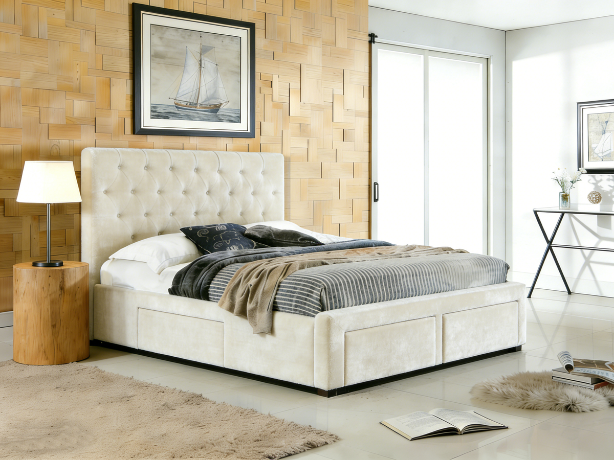 Modern bedroom with a white upholstered bed, wooden side table, and framed artwork on a wooden wall.