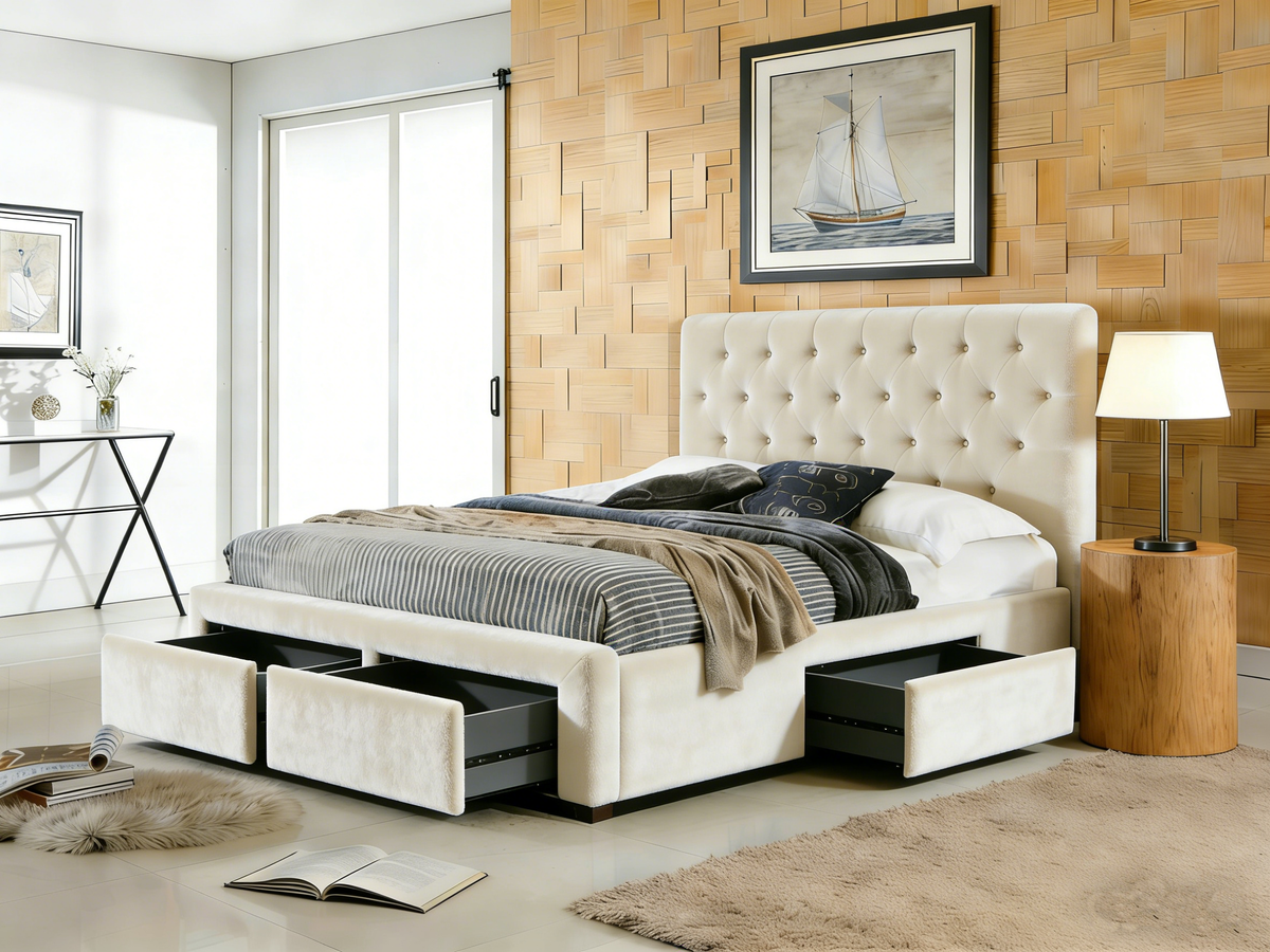 Beige upholstered bed with storage drawers in a modern bedroom setting.