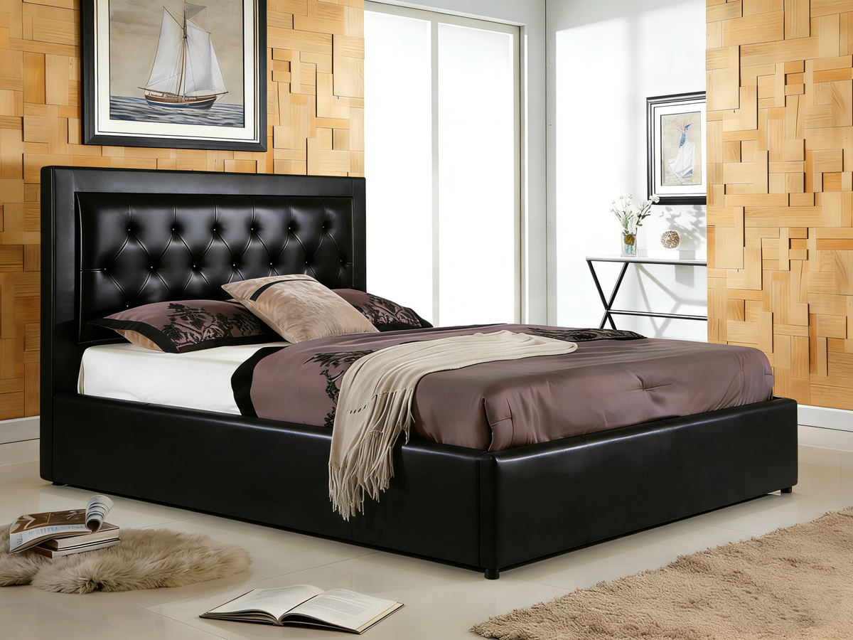 Modern bedroom with a black upholstered bed, wooden walls, and a sailboat painting.