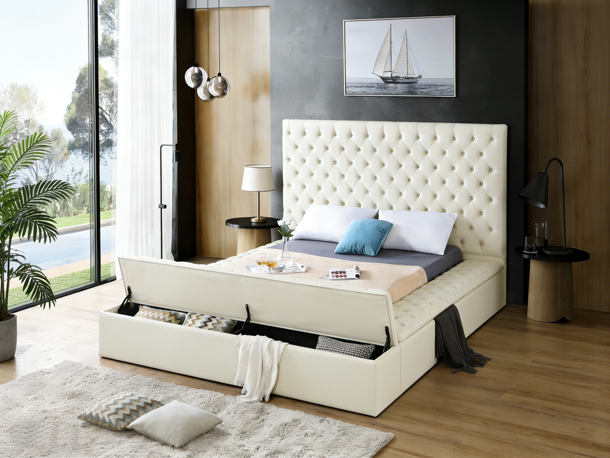 Modern bedroom with a cream-colored bed featuring storage compartments.