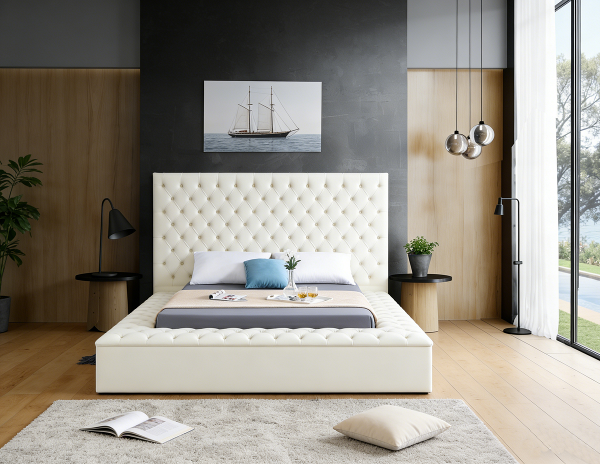 Modern bedroom with a white upholstered bed, wooden flooring, and decorative elements.