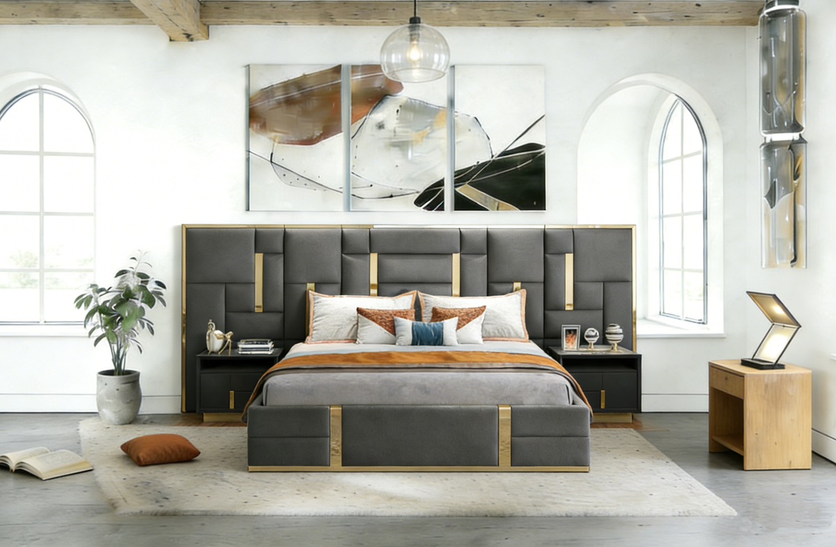 Modern bedroom with a gray upholstered bed, wooden nightstands, and decorative elements.