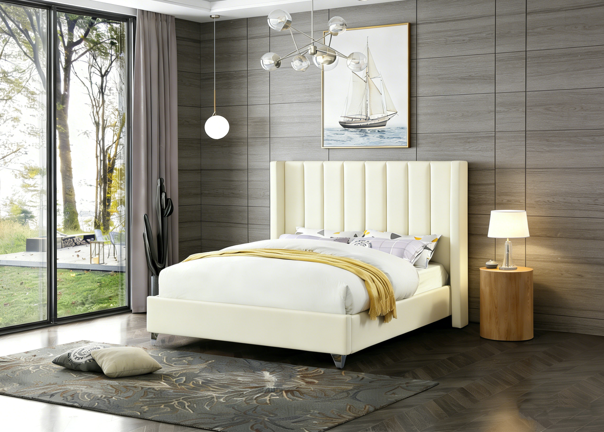 Modern bedroom with a large bed, side table, and large window.