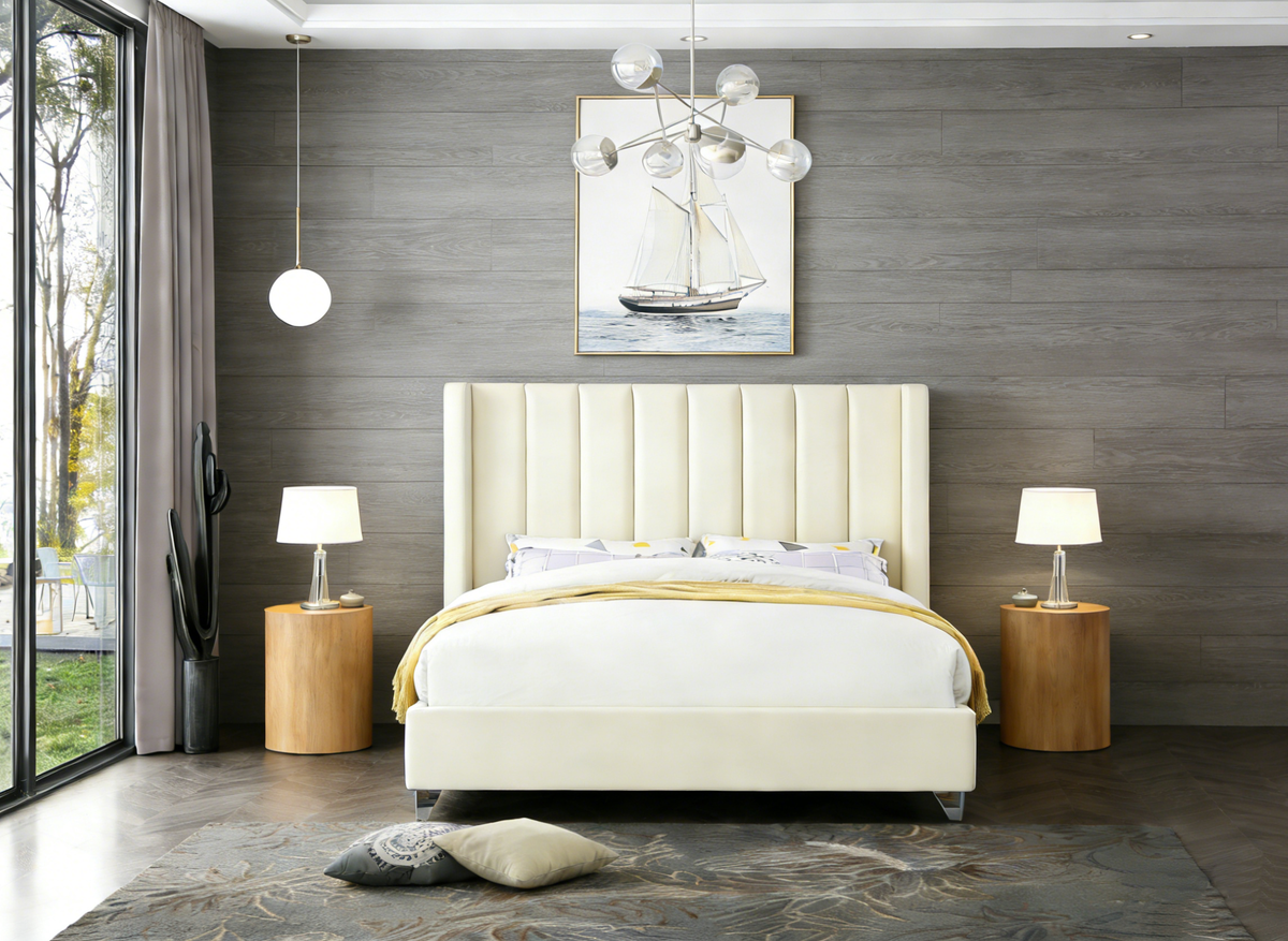 Modern bedroom with a cream bed, wooden nightstands, and a gray wall.