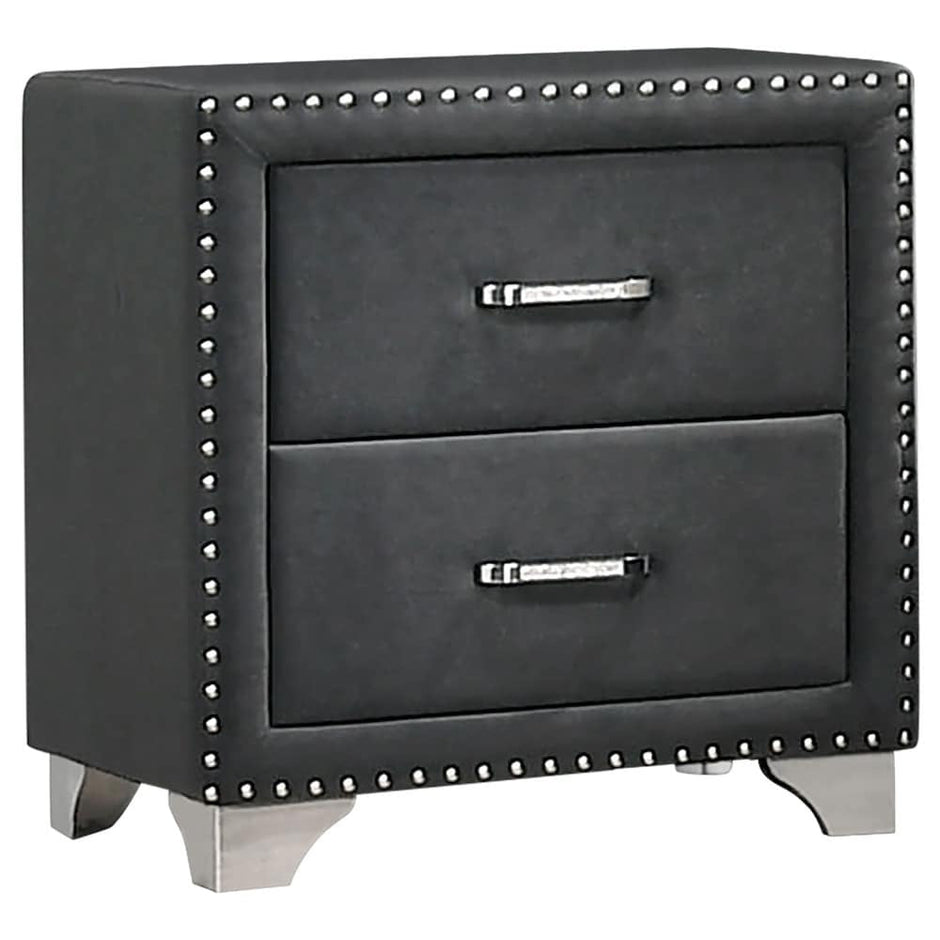 Black nightstand with two drawers and studded details on a white background
