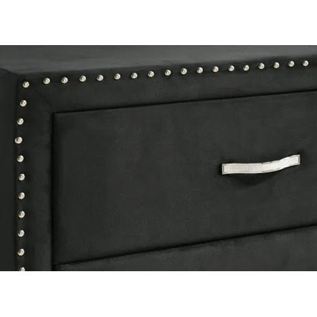 Black upholstered headboard with silver nailhead trim and handle on a white background