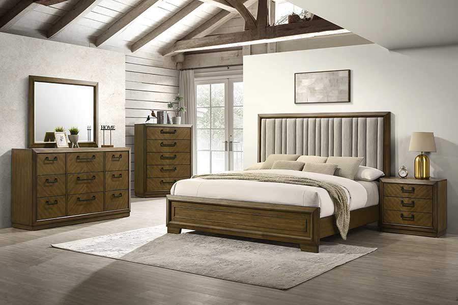Wooden bedroom furniture set with bed, dressers, and mirror in a room with wooden beams.